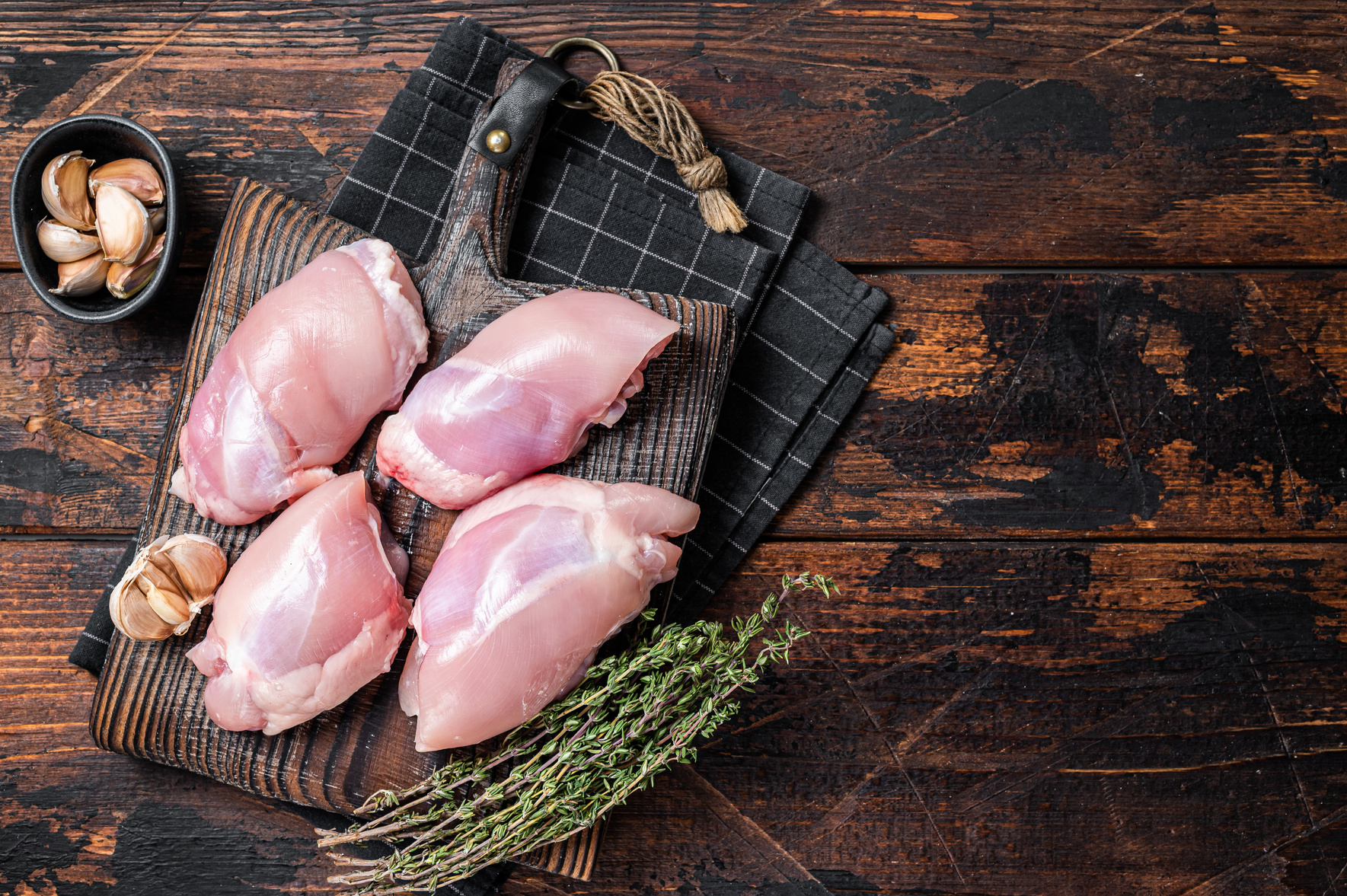Chicken thigh fillet,  Raw Boneless and skinless meat  on a